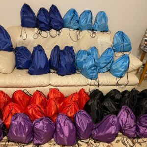 Different color bags that were given out by Jade Nealious, Founder of Crowning Lupus, handing out items